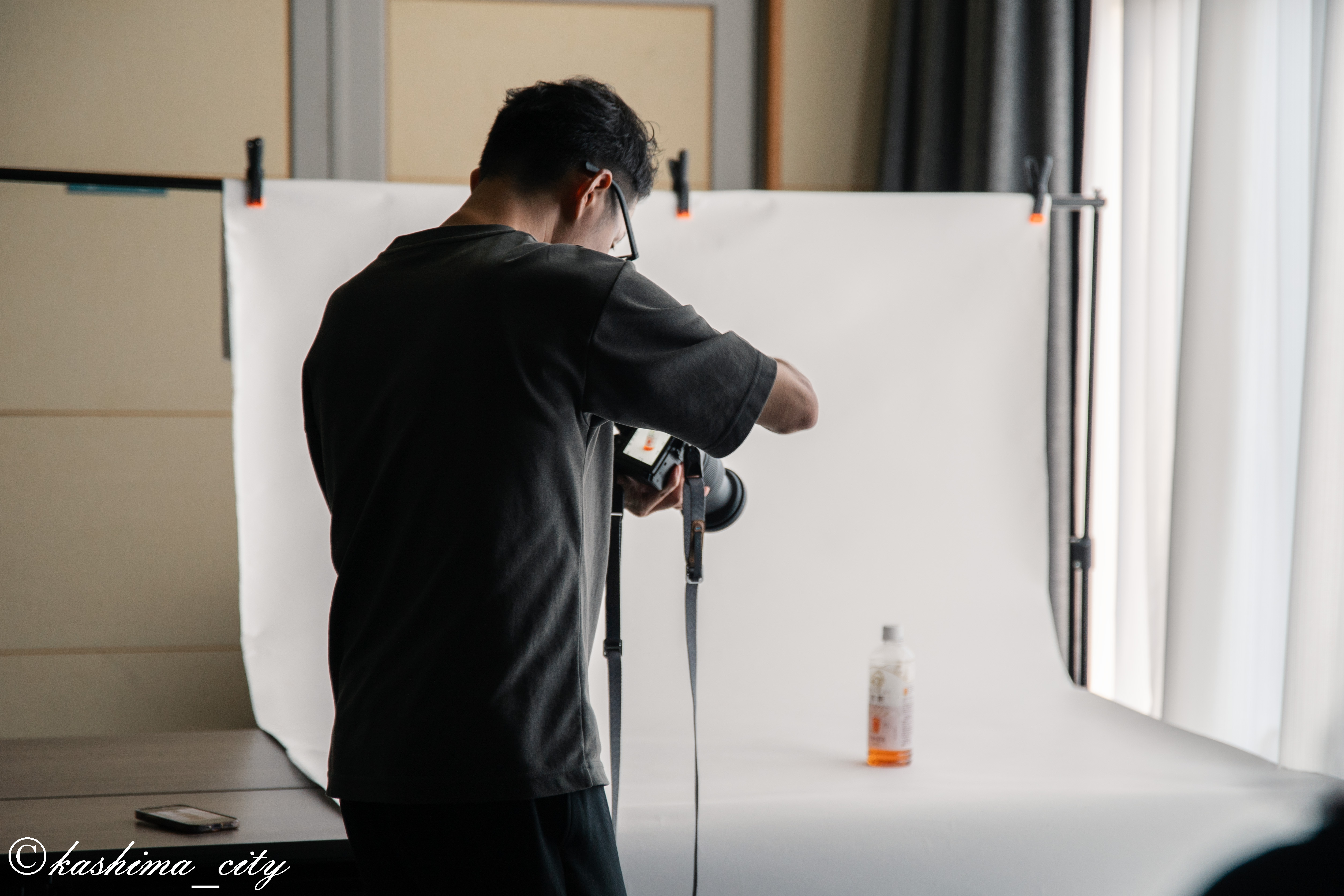 撮影の見本を見せる講師の様子2